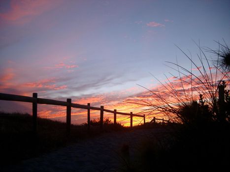 fence sunset silhouette, sand dunes near perth