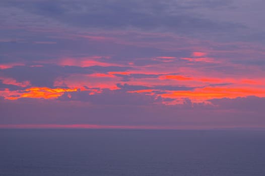 dusk sky glowing red with a beautiful vivid sunset