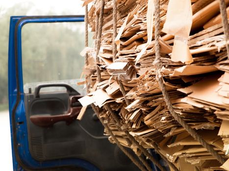 Recycling truck with carton in China.