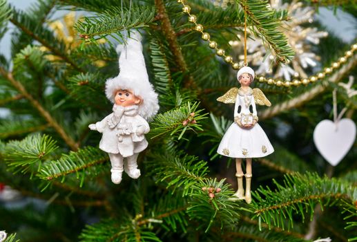 Christmas decorations on the Christmas tree Angel and little man