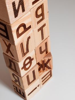 Wooden qubes with alphabet.