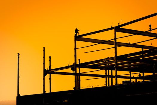 Construction site of the new retail building. Steel frame construction.