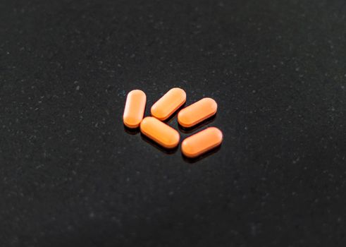 Close up shot of a an oval shaped tablets