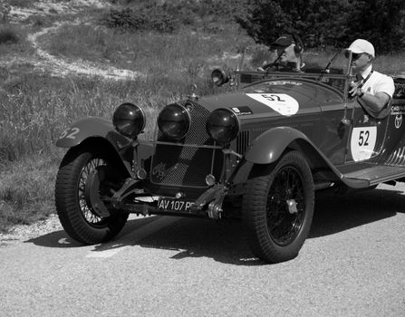 URBINO - ITALY - JUN 16 - 2022 : ALFA ROMEO 6C 1750 SS ZAGATO 1929 on an old racing car in rally Mille Miglia 2022 the famous italian historical race (1927-1957