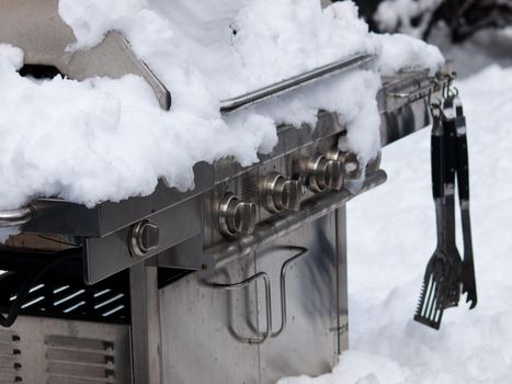 Grill under the snow.