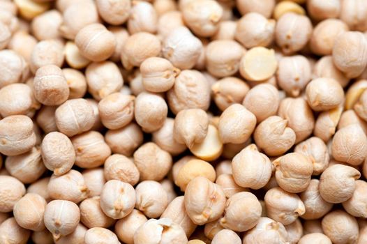 Background of dried chickpeas, a legume and one of the earliest cultivated vegetables very high and protein and a staple in vegetarian cuisine