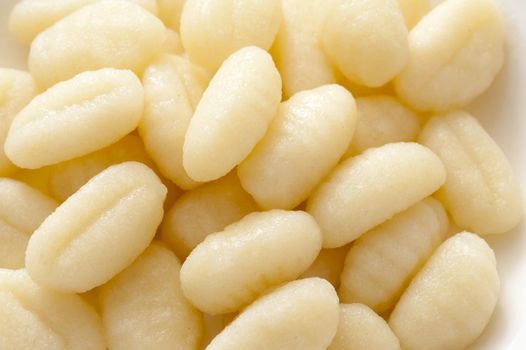 Pile of white freshly made Italian Gnocchi