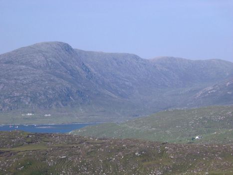 landscape of the scottish highlands, looking out over a loch