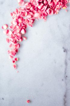 Art of flowers, wedding invitation and nature beauty concept - Rose petals on marble stone, floral background