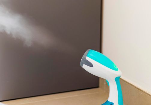 Close up shot of a steam iron.
