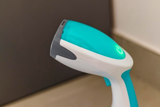 Close up shot of a steam iron.