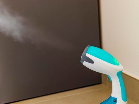 Close up shot of a steam iron.