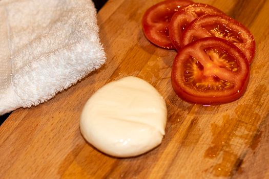 Food photography. Mozzarella cheese and tomatoes