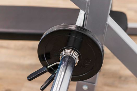 Close up shot of various gym equipment and weights.