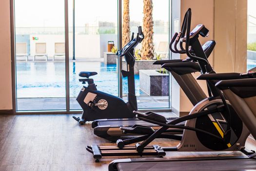 Close up shot of various gym equipment and weights.