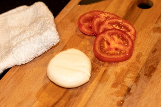 Food photography. Mozzarella cheese and tomatoes