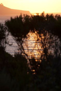 sunset over california's famous bigsur coastline