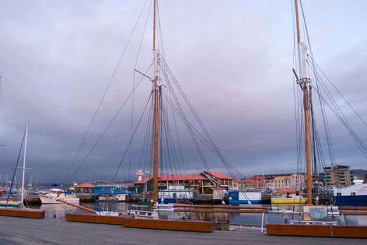 masts of a wooden boat berthed in constitution dock, hobart, tasmania