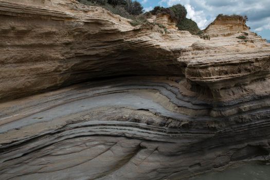 a mountain on the seashore in a section on the coast of Sidari on the island of Corfu in Greece High quality photo