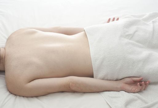 Laying face down for a relaxing massage