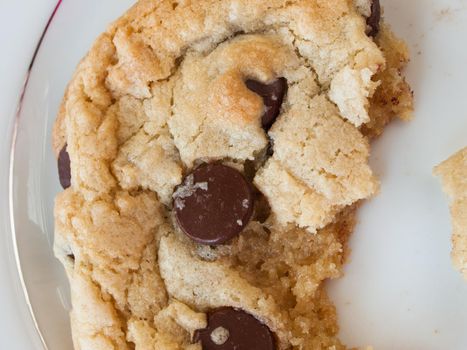 Broken homemade chocolate chip cookies.