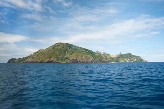 Ocean view from a cruise ship of Kuata Island , Fiji, which his uninhabited but has a small eco resort for tourists