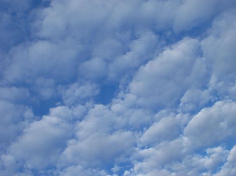 white clouds in a blue sky