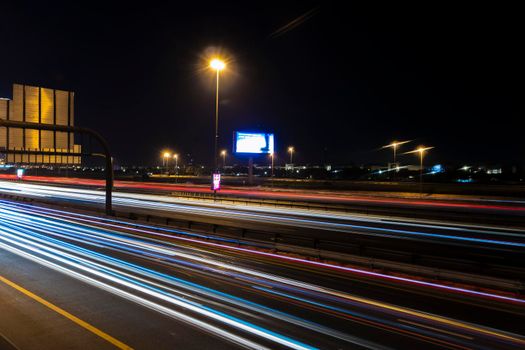 Dubai, UAE - 06.04.2021 Light trails on Al Khail road at night