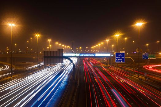 Dubai, UAE - 06.04.2021 Light trails on Al Khail road at night