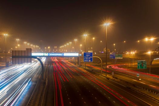 Dubai, UAE - 06.04.2021 Light trails on Al Khail road at night