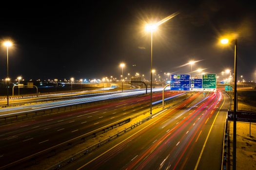 Dubai, UAE - 06.04.2021 Light trails on Al Khail road at night