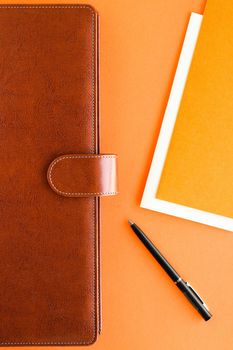 Modern workspace, productivity and corporate lifestyle concept - Luxury business brown brief-case on the office table desk, flatlay