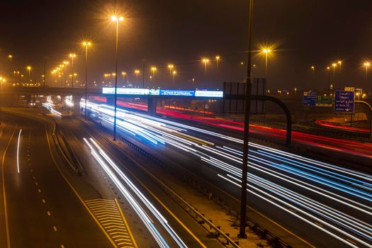 Dubai, UAE - 06.04.2021 Light trails on Al Khail road at night