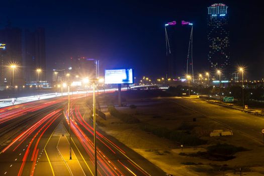 Dubai, UAE - 06.04.2021 Light trails on Al Khail road at night