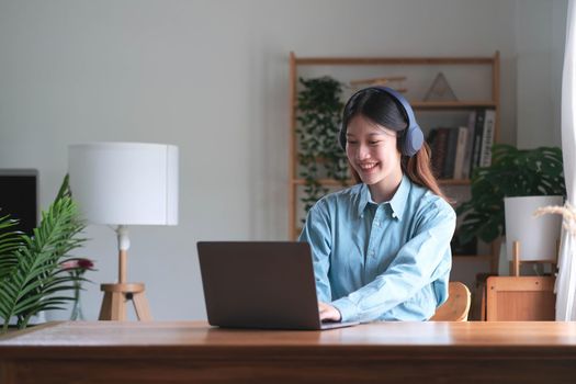 Asian girl student online learning class study online video call zoom teacher, Happy asian girl learn english language online with computer laptop..