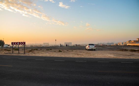 Men gathering up for the game of the cricket on early morning in Al Warqa area of Dubai. UAE Outdoors