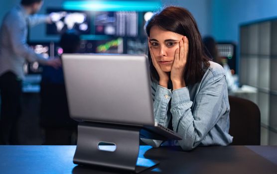 Frustrated tired and scared female financial analyst after seeing investment results. Stock market and trading concept.