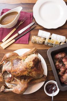 Thanksgiving turkey with side dishes served on table