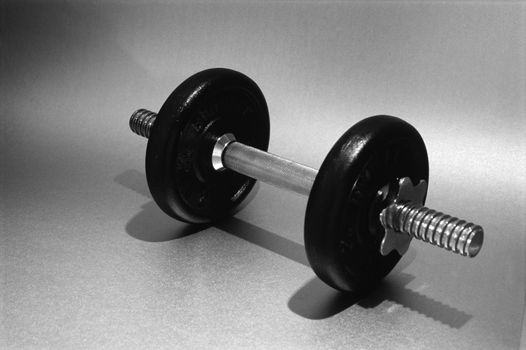 a metal weight training dumbell