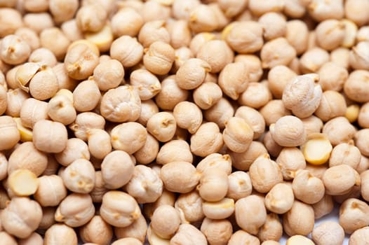 Background of chickpeas, or garbanzo beans, a seed of the Cicer arietinum plant which is high in protein and was one of the first vegetables to be cultivated