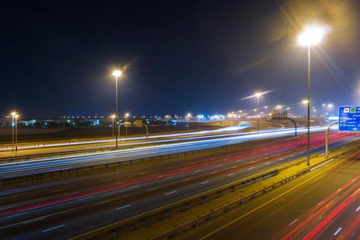 Dubai, UAE - 06.04.2021 Light trails on Al Khail road at night