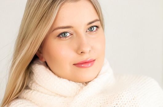 Autumn winter fashion and knitwear, beautiful woman wearing warm knitted scarf, close-up portrait