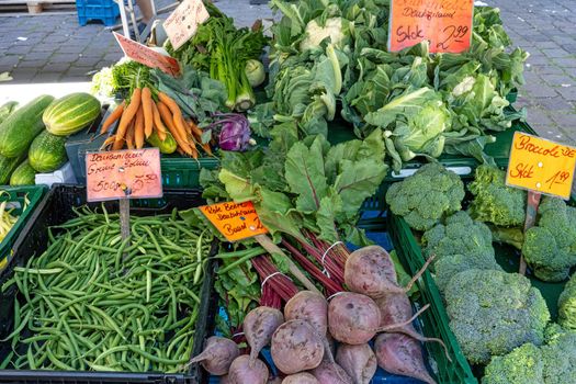 Green beans, beetroot, broccoli and other vegetables for sale at a market