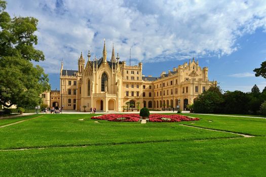 A beautiful castle with a garden and a park. Lednice - Czech Republic - South Moravia. A popular tourist spot for travel and excursions. Landscape with nature in summer time.