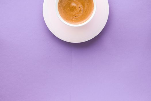 Breakfast, drinks and cafe menu concept - Coffee cup on purple background, top view flatlay