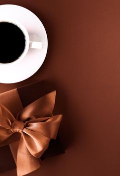 Romantic present, cafe backdrop and drink concept - Coffee cup and luxury gift box flatlay background