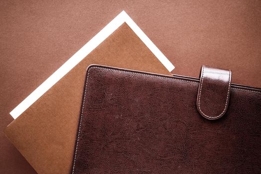 Productivity, work and corporate lifestyle concept - Vintage business briefcase on the office table desk, flatlay background