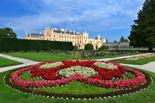 A beautiful castle with a garden and a park. Lednice - Czech Republic - South Moravia. A popular tourist spot for travel and excursions. Landscape with nature in summer time.