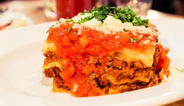 Italian cuisine, restaurant menu and food photography blog concept - Lasagna bolognese plate, traditional recipe with tomato sauce, cheese and meat