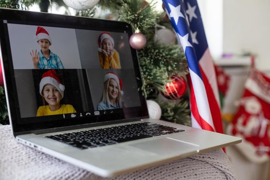 Studying and working with a laptop, usa flag, christmas.